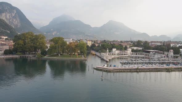 Italy, Riva Del Garda Lakefront. Aerial View of City Marina and Downtown, Summer