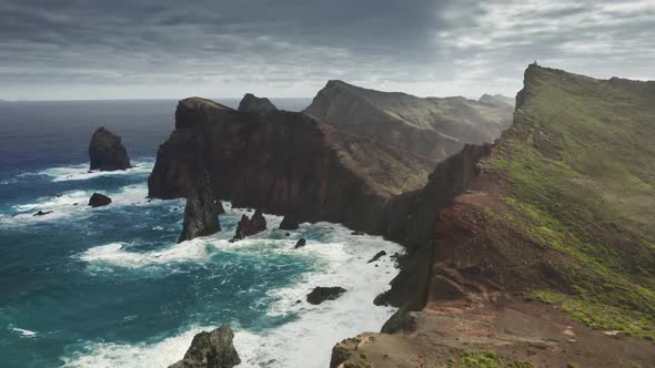 Drone Footage of Rocky Volcanic Cliffs Surrounded with the Atlantic Ocean