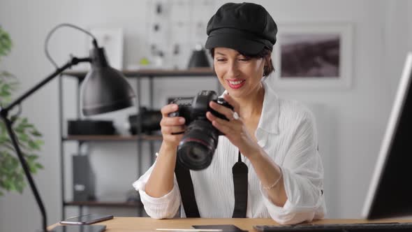 Photographer Reviewing Pictures on Camera