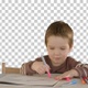 A son drawing at the table at home, Alpha Channel - VideoHive Item for Sale