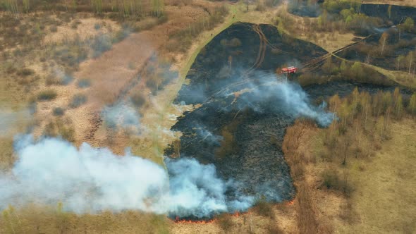 Aerial View Spring Dry Grass Burns During Drought Hot Weather