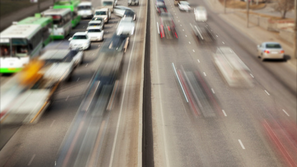 Blurred Cars on City Road