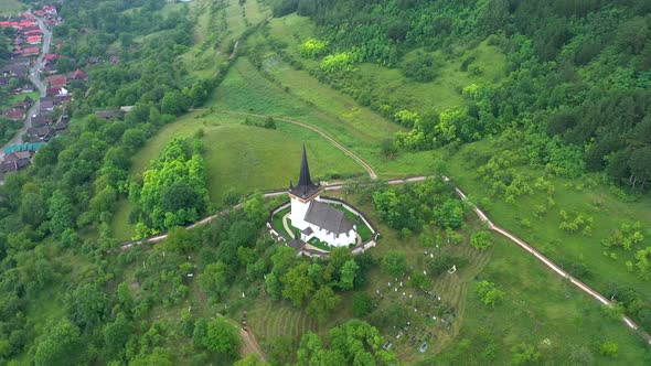 Flying Over a Whitewashed Village Church