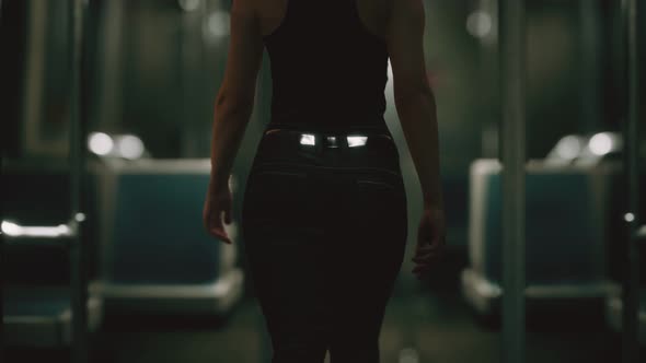 Slow Motion Young Woman in Metro alt