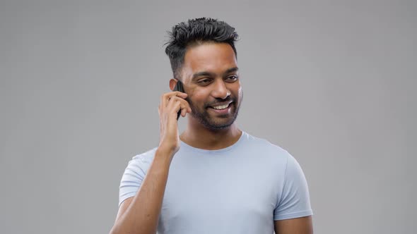 Happy Indian Man Calling on Smartphone 49