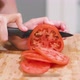 Chopping a Red Tomato - VideoHive Item for Sale