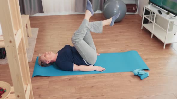 Elderly Age Woman Exercising