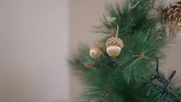 Hanging Acorn Ornament In A Christmas Tree