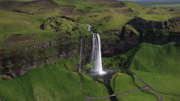 Seljalandsfoss waterfalls in Iceland with drone video stable.