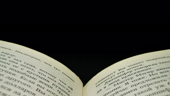 Macro Footage of Russian Words on Pages of a Book