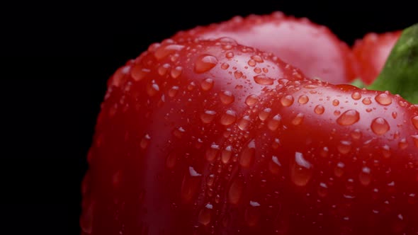 Closeup Footage of Water Drop on Red Paprika Pepper. Concept of Healthy Nutrition and Organic Food