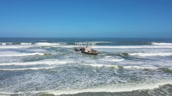 Aerial view of a shipwreck along the shore, Swakopmund, Namibia.