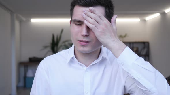 Headache, Portrait of Businessman in Office