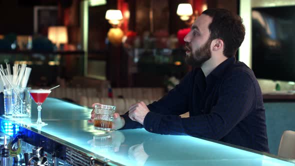 Male Client with Cash Money Paying for Cocktail in Bar