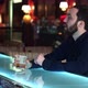 Male Client with Cash Money Paying for Cocktail in Bar - VideoHive Item for Sale