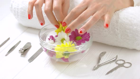 Manicured Hands Receiving Spa Procedure.