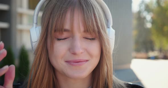 Portrait of a Young Girl with Headphone