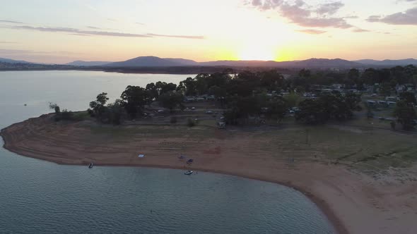 Flying Over Beautiful Lake at Sunset in Australia