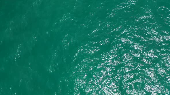 Abstract fast motion sea waves background, Beautiful Texture Of Emerald Water, Malaysia