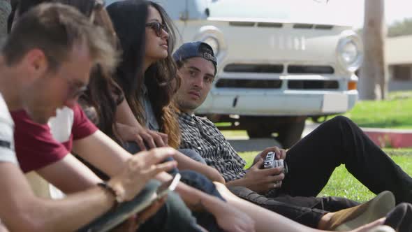 Group of young people on road trip hanging out