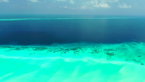 Aerial top view travel of paradise lagoon beach break by blue lagoon and clean sand background of a 