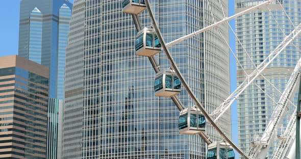 Hong Kong ferris wheel and office tower