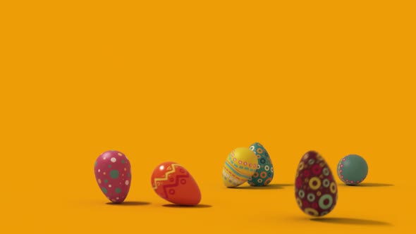 falling easter eggs on a uniform background