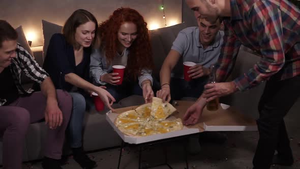 Diverse People Friends Got Together to Eat Pizza at Home