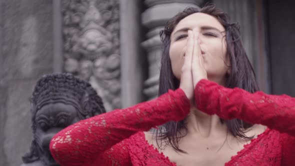 Stunning Young Woman In Red Dress At Temple