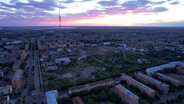 Pink Sunset Over a Small Town