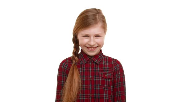 Cute Elementaryschool Aged Girl with Light Brown Plait of Hair Standing on White Background and