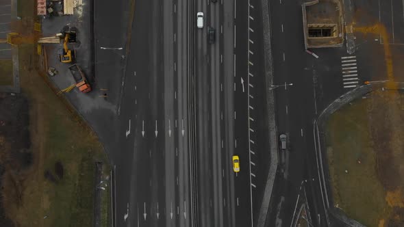 Top View of a Major Road in the City. Top View of the Road Junction. The Camera Is Dropping Over the