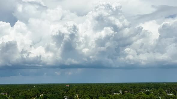 Dark Stormy Clouds Forming on Gloomy Sky Before Heavy Rainfall Over Suburban Town Area