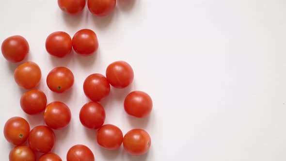 Red Juicy Chili Tomatoes on a White Background Roll Out