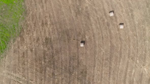 Rolls of Haystacks on the Field