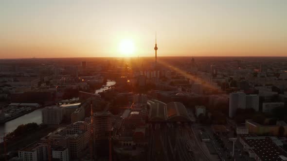 AERIAL: Flight Over Berlin, Germany at Beautiful Sunset, Sunlight and View on Alexanderplatz TV