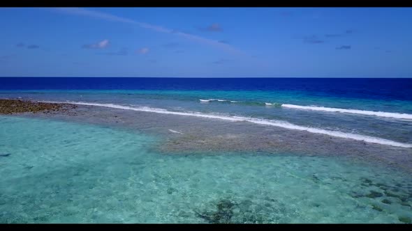 Aerial top view texture of idyllic coastline beach time by blue sea with white sandy background of a