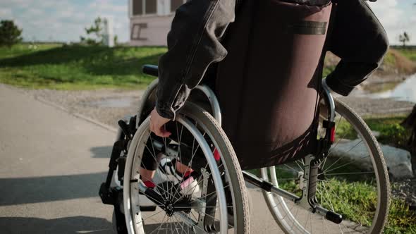 Disabled Woman on Walk in the Town