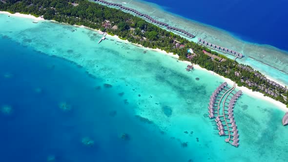 Aerial drone panorama of coastline beach journey by clear ocean with sand background