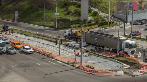 Yellow Construction Telescopic Mobile Crane Unloading Railway Sleepers From Truck Timelapse.