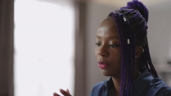 Black Woman is Communicating By Video Conference in Laptop Portrait of Pretty Afroamerican Lady with