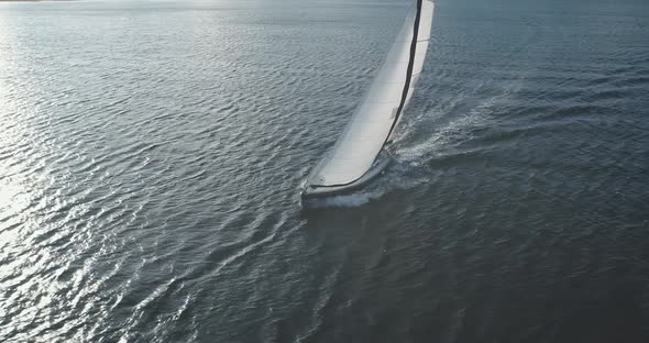 Sun Reflection at Closeup Luxury Yacht on Ocean Bay Aerial