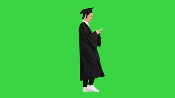 Smiling Female Graduate Mortarboard Sharing Happy News Her Phone While Walking Green Screen Chroma