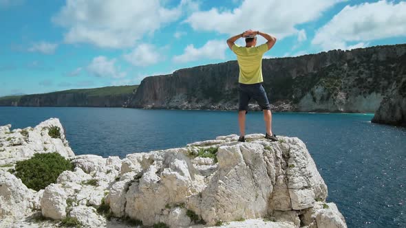 Rear View of Traveler on Vacation in Greece Admiring Amazing Seascape on Kefalonia Island. Vacation