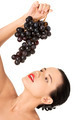 Beautiful sensual brunette eating grapes - PhotoDune Item for Sale