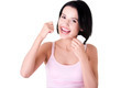 Young woman using dental floss - PhotoDune Item for Sale