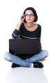 Young thoughtful woman with a laptop - PhotoDune Item for Sale