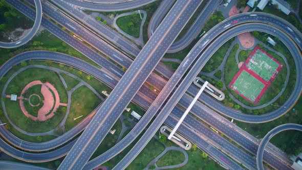 4K : Time lapse Aerial view and top view of traffic on city. Expressway with car lots