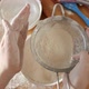 Top View of Young Woman Shaking Sieve for Sifting Flour While Making Dough - VideoHive Item for Sale