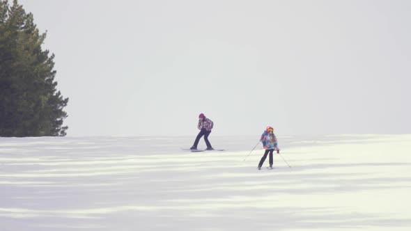 Tourists Relax at the Mountains Ski Resort